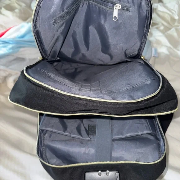 Black and Brown Backpack with Padded Straps and Durable Fabric - Picture 11 of 11